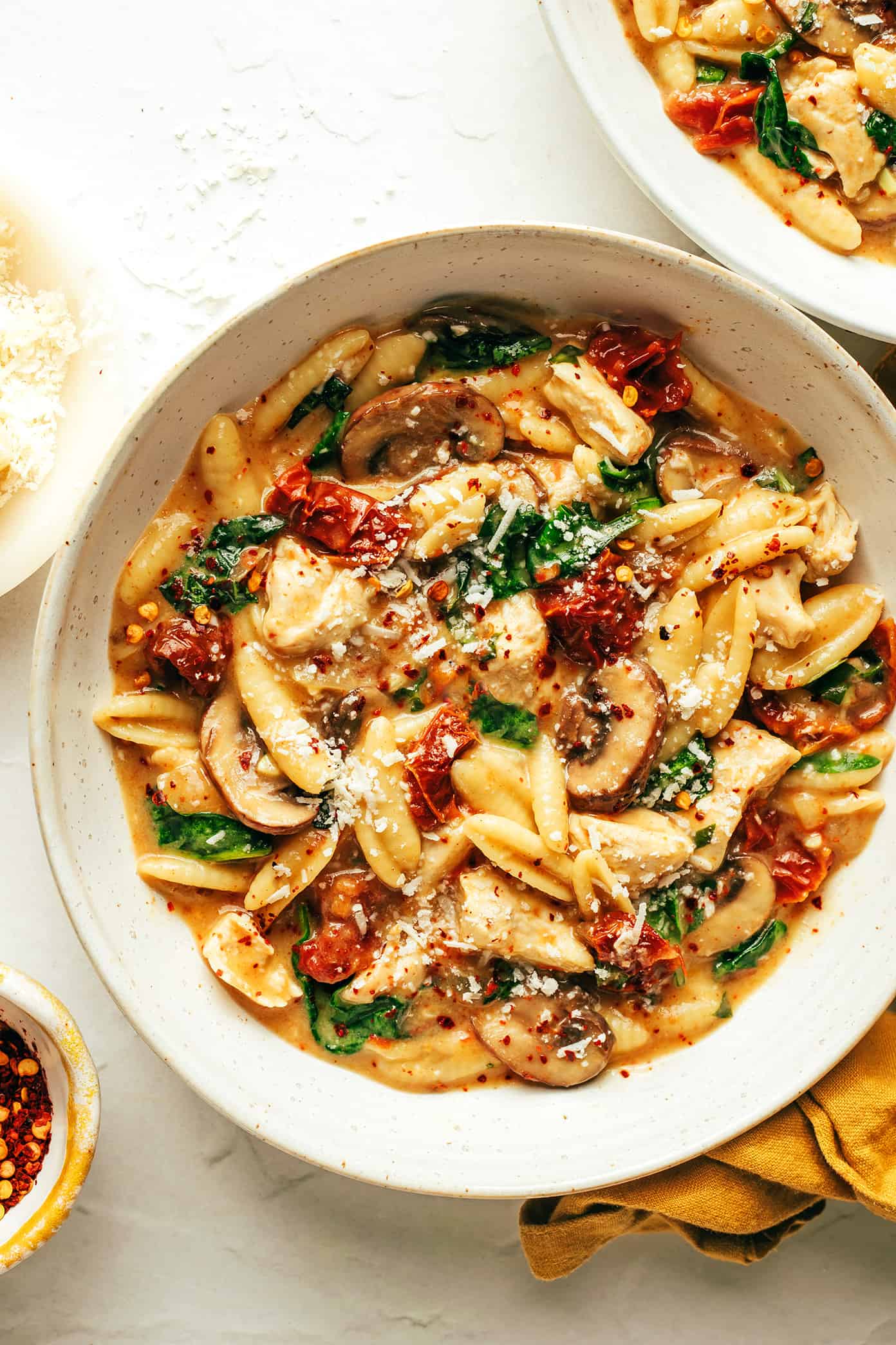 One Pot Creamy Sun-Dried Tomato Pasta in Bowl with Parmesan
